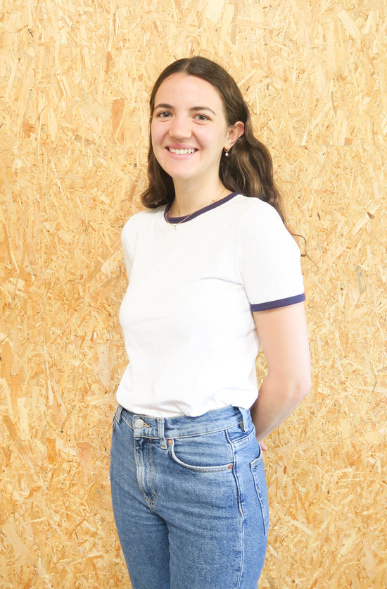 Mathilde Lecas Buyer & Analyst - white T-shirt and a blue jean and long brown hair